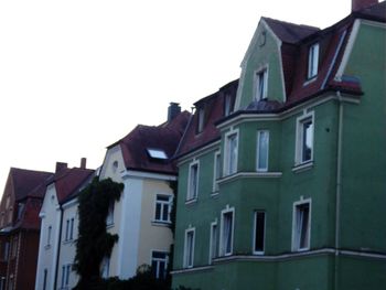 Low angle view of buildings against sky