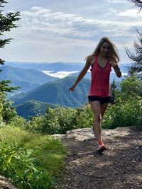 Full length of woman against mountains