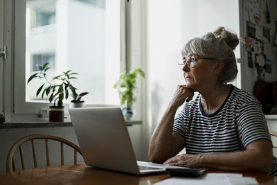 Senior woman using laptop