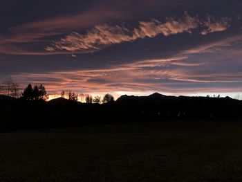 Scenic view of silhouette landscape against sky during sunset