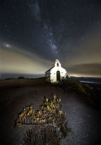 Scenic view of building against sky at night