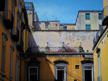 Low angle view of residential buildings against sky