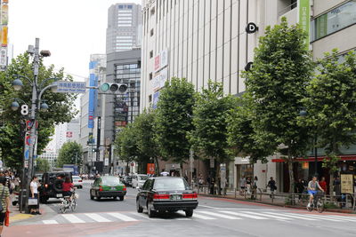 Cars on road in city