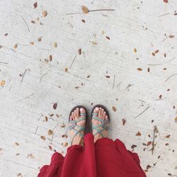 Low section of woman standing on floor