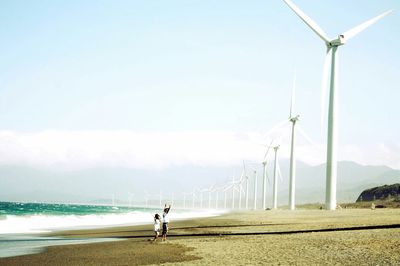 Woman standing on beach