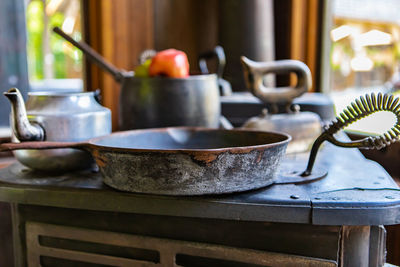 Close-up of kitchen utensils on table at home