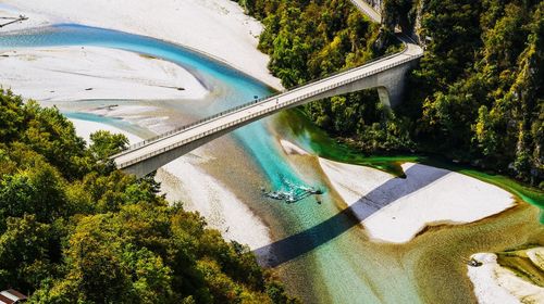 High angle view of river amidst trees