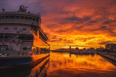 Scenic view of sea against orange sky