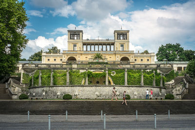 Group of people in front of building