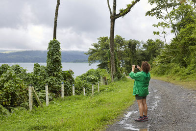 Rear view of woman walking in park