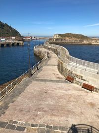 Scenic view of sea against blue sky