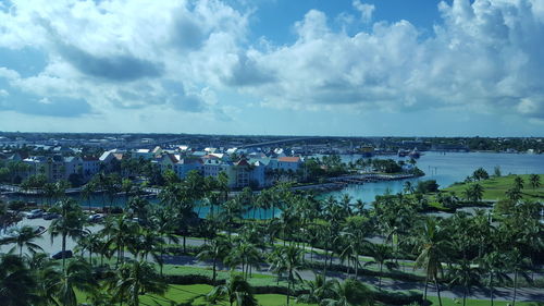 High angle view of buildings and trees against sky