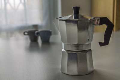 Close-up of coffee on table at home