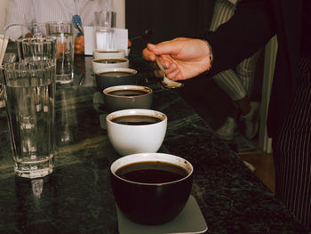 Hand holding coffee cup