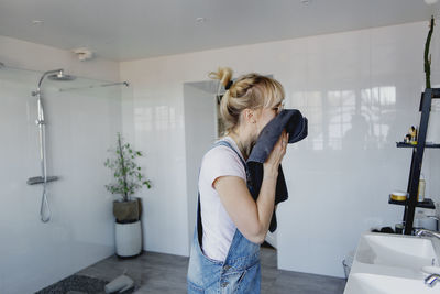 Woman drying face