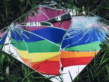 High angle view of multi colored umbrellas on field