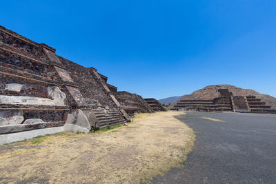 View of temple against clear blue sky