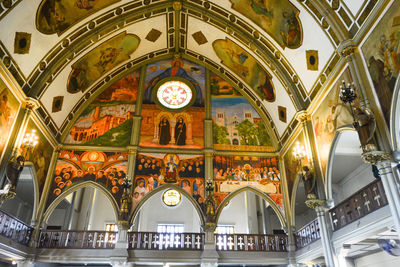 Low angle view of illuminated ceiling in building