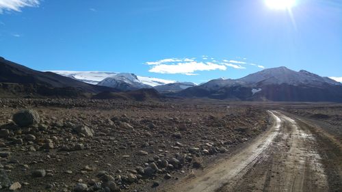 Scenic view of mountains against sky during winter