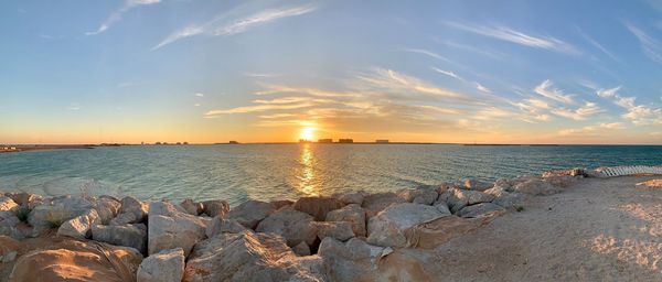 Scenic view of sea against sky during sunset