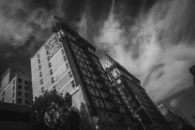 Low angle view of modern buildings against sky