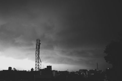 Low angle view of built structure against cloudy sky