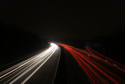 Light trails on road at night