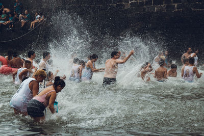 Group of people in swimming pool