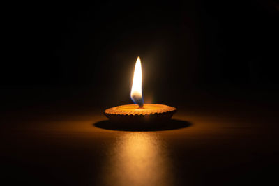 Close-up of illuminated candle