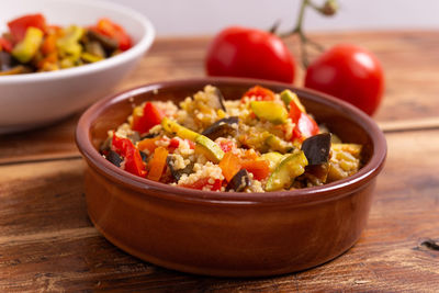 Close-up of cous cous salad in bowl on table