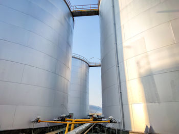 Low angle view of factory against sky