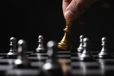 Close-up of chess pieces against blurred background