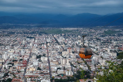 Overhead cable car over city