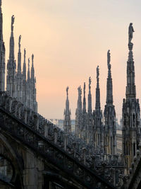 Panoramic view of buildings against sky during sunset