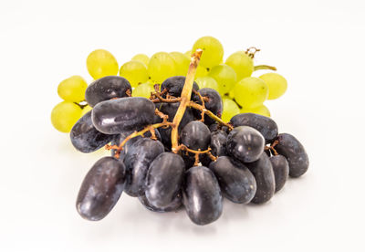 High angle view of grapes against white background