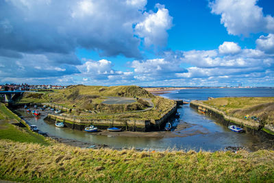 Scenic view of sluice against sky