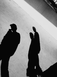 Silhouette men shadow on wall