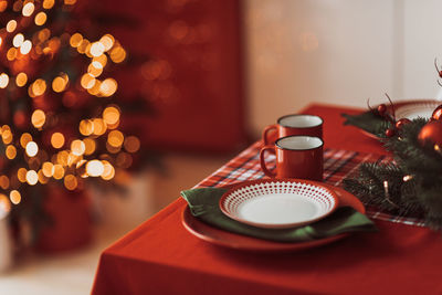 Close-up of christmas decoration on table at home