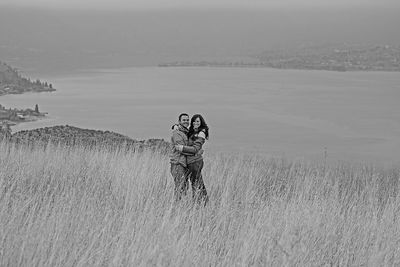 Woman standing on shore