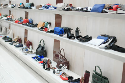 Variety of shoes on table