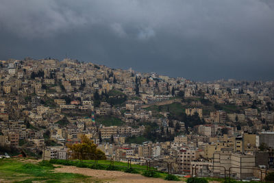 Buildings in city against sky