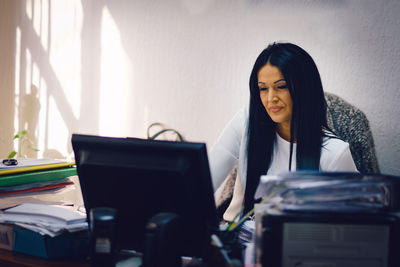 Businesswoman working in office