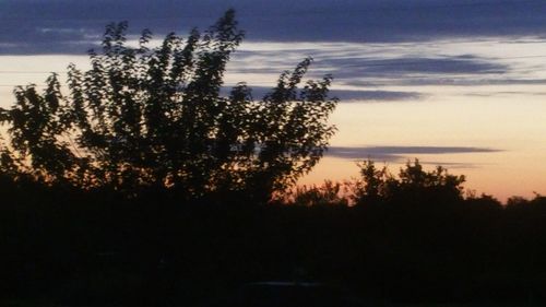 Scenic view of sea against sky at sunset