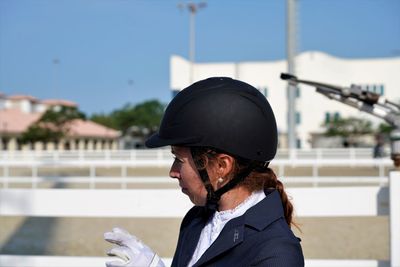 Woman wearing helmet outdoors