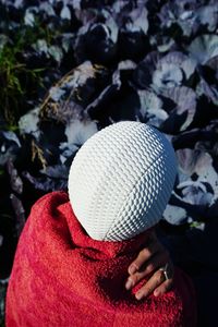 Rear view of person wearing hat