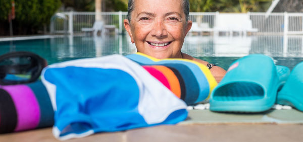 Portrait of smiling woman in swimming pool