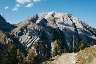 Scenic view of snowcapped mountains against sky