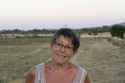 Portrait of smiling man on field