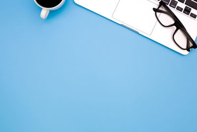 High angle view of mobile phone on table