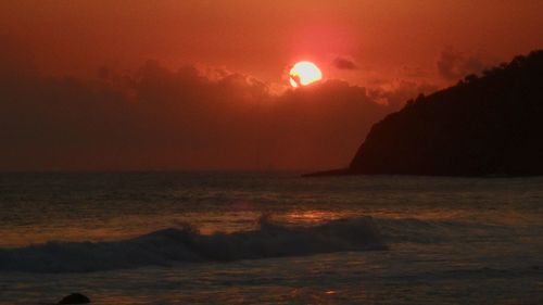 Scenic view of sea against sky during sunset